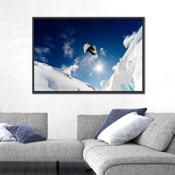 Snowboarder Jumping Through The Air With Blue Sky Canvas Wall Art-5 Horizontal-Gallery Wrap-22" x 12"-Tiaracle