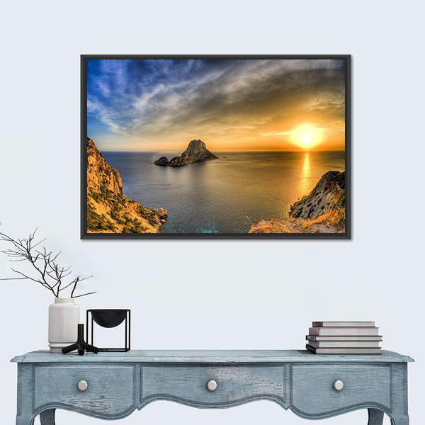 Rocky Coast Sunset with Sea Stack Canvas Wall Art in orange, yellow and blue, framed canvas, product view on a white background