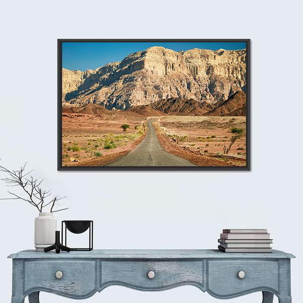Timna Park Desert Road Landscape Canvas Wall Art in beige, brown and blue, framed canvas, product view on a white background