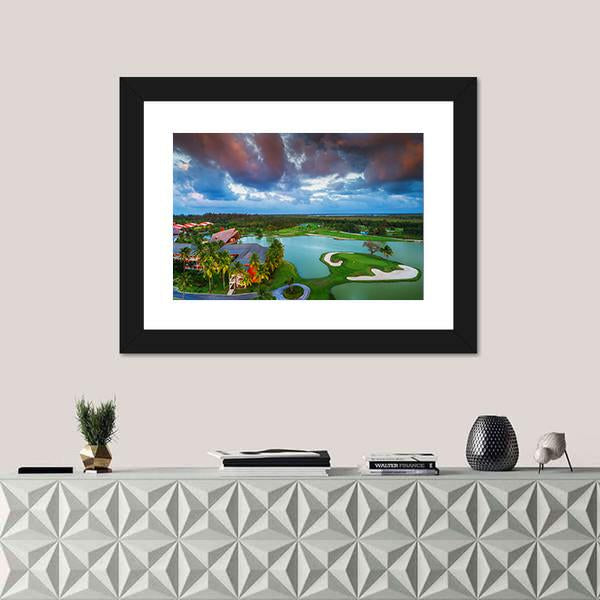 Sunset Tropical Golf Course Aerial View Canvas Wall Art in orange, green and blue, framed print, product view on a white background