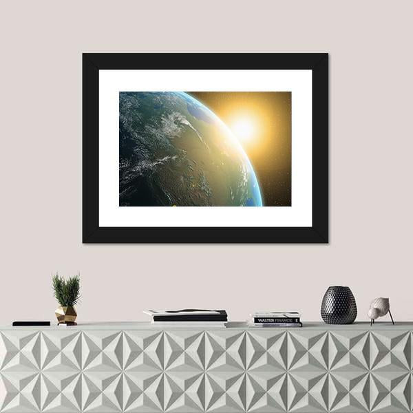 View of Sunrise Over North America Canvas Wall Art in black, yellow and blue, framed print, product view on a white background