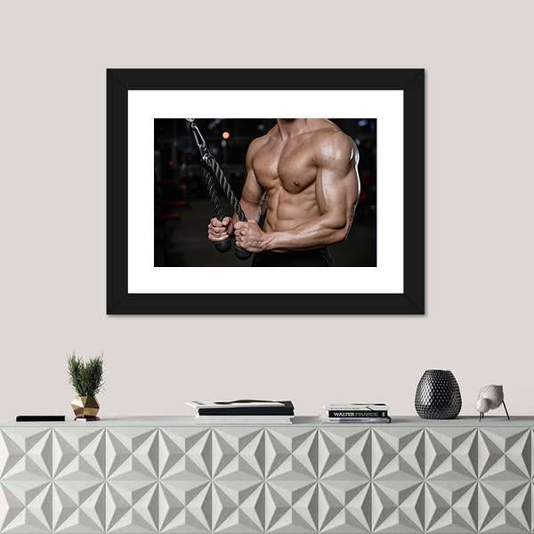 Bodybuilder Torso with Tricep Rope Canvas Wall Art in black, beige and brown, hung on a wall