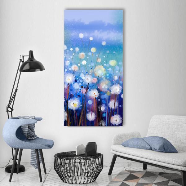 Dreamy Blue Dandelion Field Vertical Canvas Wall Art in white and blue, single vertical panel hung on a wall