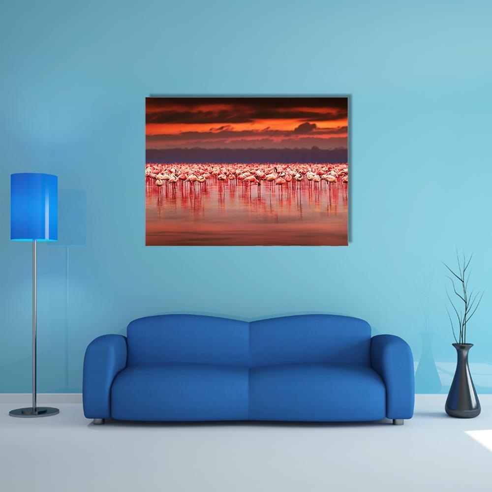 African Flamingos in Lake at Sunset Canvas Wall Art in red, orange and pink, single panel hung on a wall