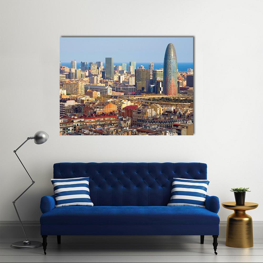 Torre Glòries Over Barcelona Skyline Canvas Wall Art in beige, brown and blue, single panel hung on a wall