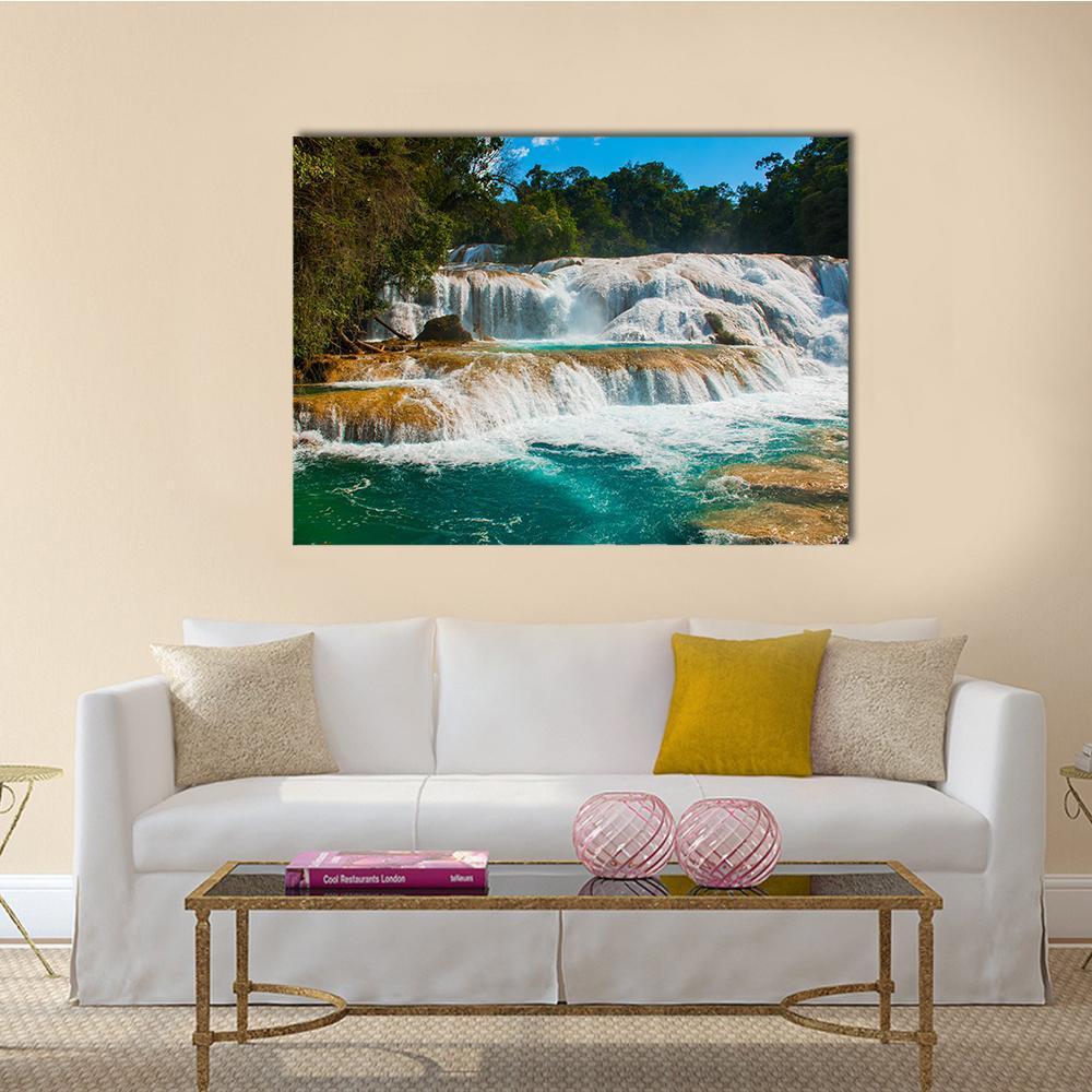 Agua Azul Waterfall Canvas Wall Art in white, green and blue, single panel hung on a wall