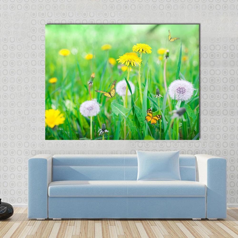 Air Dandelions on Green Field Canvas Wall Art in white, yellow and green, single panel hung on a wall
