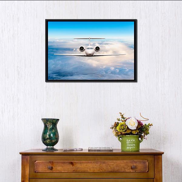 Private Jet in Flight Canvas Wall Art in white and blue, framed canvas, product view on a white background