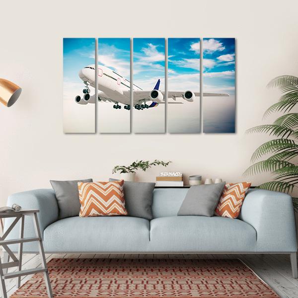 Airplane Against Blue Sky Canvas Wall Art-5 Horizontal-Gallery Wrap-22" x 12"-Tiaracle