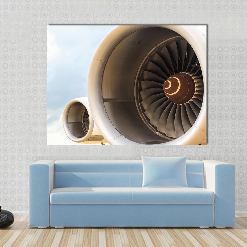 Airplane Engine Jet Canvas Wall Art in gray, beige and silver, single panel hung on a wall