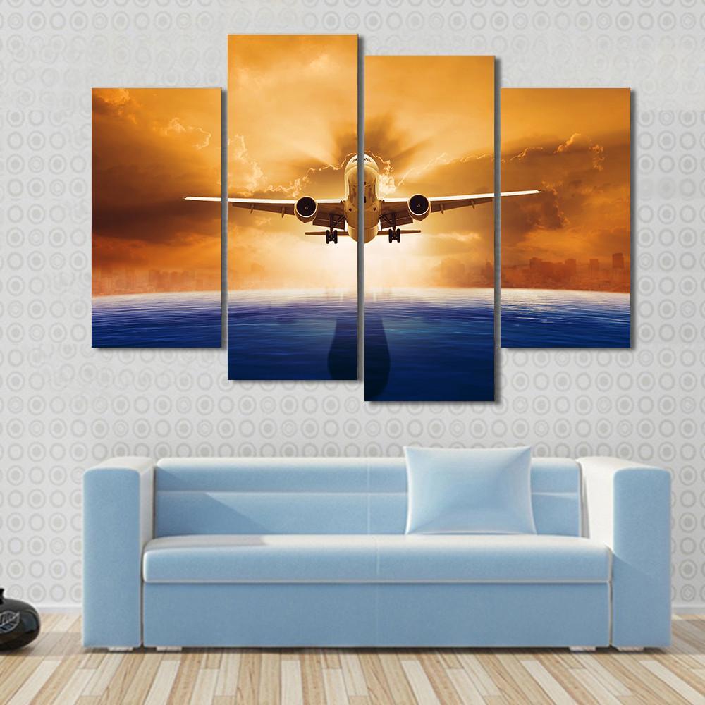 Airplane Flying Above Ocean Canvas Wall Art-4 Pop-Gallery Wrap-50" x 32"-Tiaracle