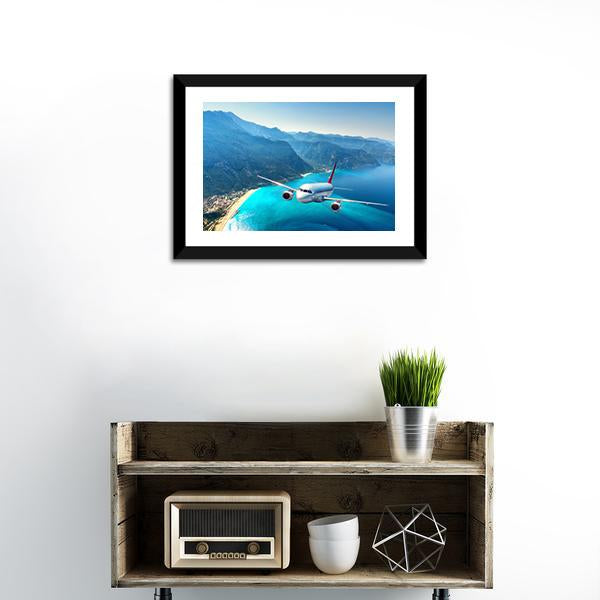 Airplane Flying Over Sea Canvas Wall Art-1 Piece-Framed Print-20" x 16"-Tiaracle