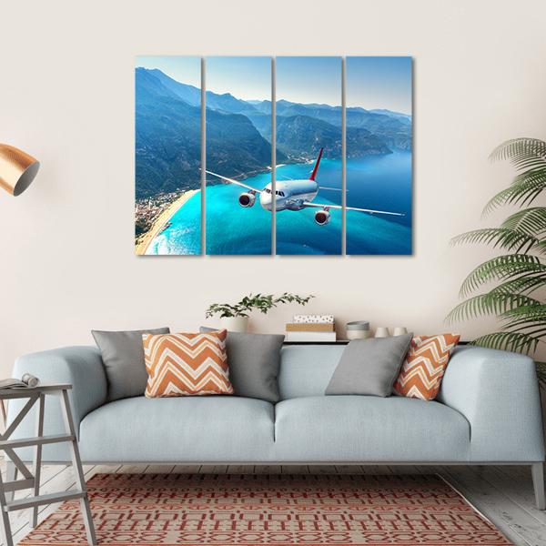 Airplane Flying Over Sea Canvas Wall Art-4 Horizontal-Gallery Wrap-34" x 24"-Tiaracle