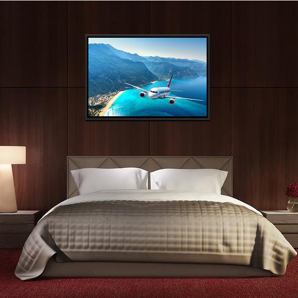 Airplane Flying Over Sea Canvas Wall Art-3 Horizontal-Gallery Wrap-25" x 16"-Tiaracle