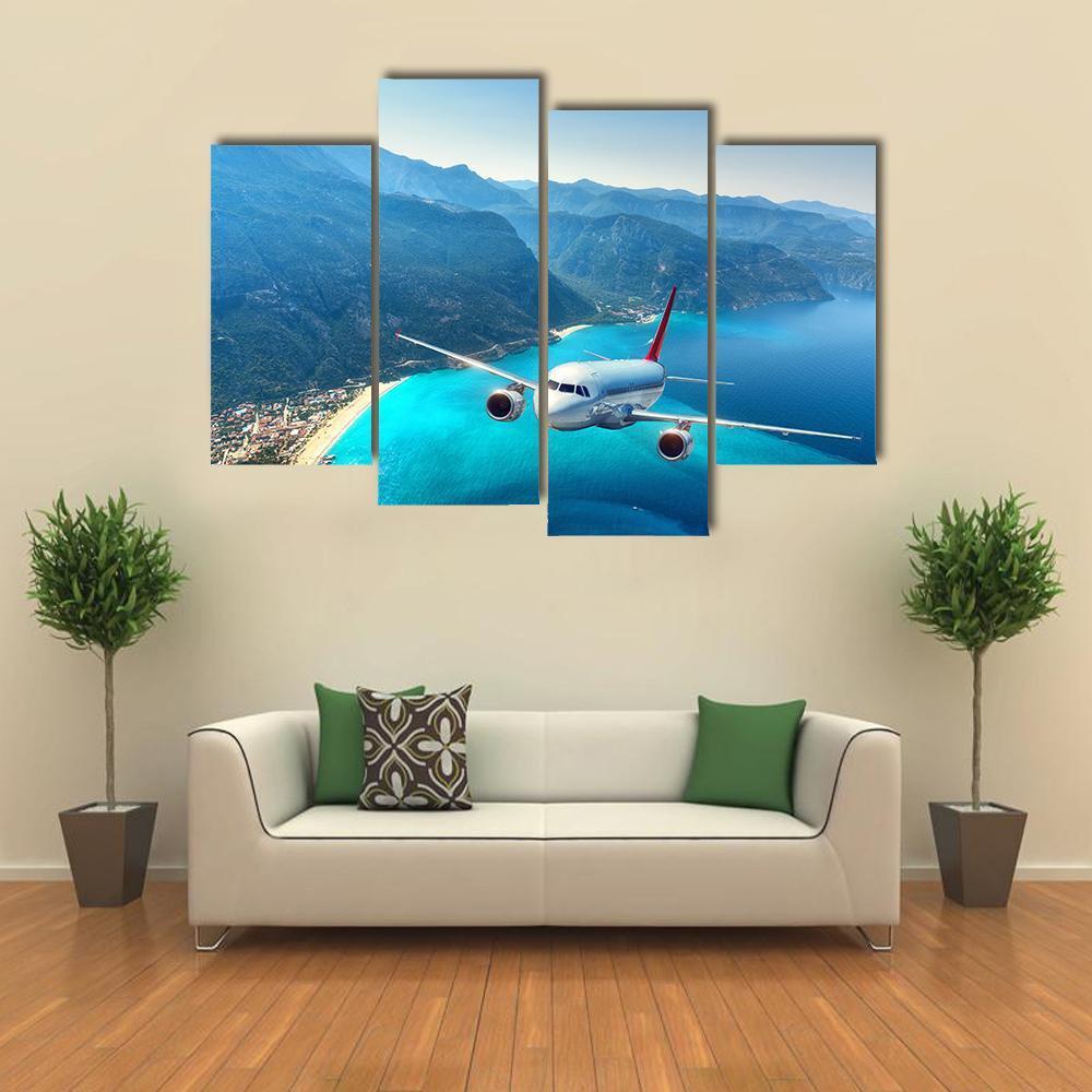 Airplane Flying Over Sea Canvas Wall Art-4 Pop-Gallery Wrap-50&quot; x 32&quot;-Tiaracle