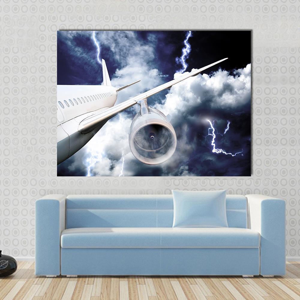 Airplane in Thunderstorm Canvas Wall Art in black, white and blue, single panel hung on a wall