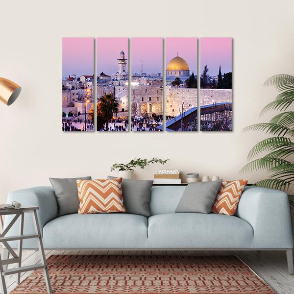 Al Aqsa Mosque at Dusk Canvas Wall Art in beige, blue and pink, hung on a wall