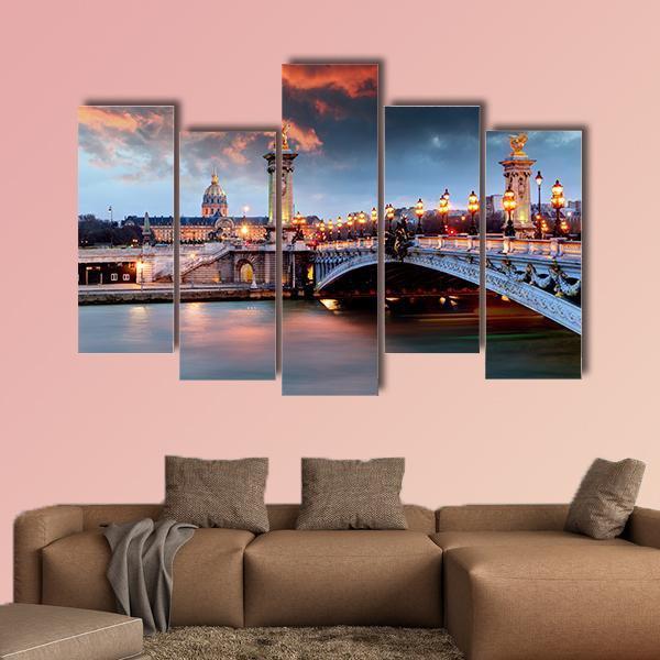 Alexandre Iii Bridge in Paris Canvas Wall Art in gold, orange and blue, 4 panel Pop layout hung on a wall