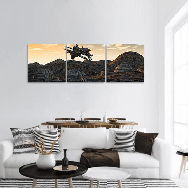Alien Spaceship Over Dome Habitats Panoramic Canvas Wall Art in black, brown and orange, hung on a wall