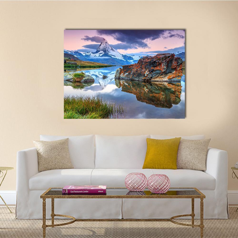 Alpine Lake and the Matterhorn Canvas Wall Art in white, brown and blue, single panel hung on a wall