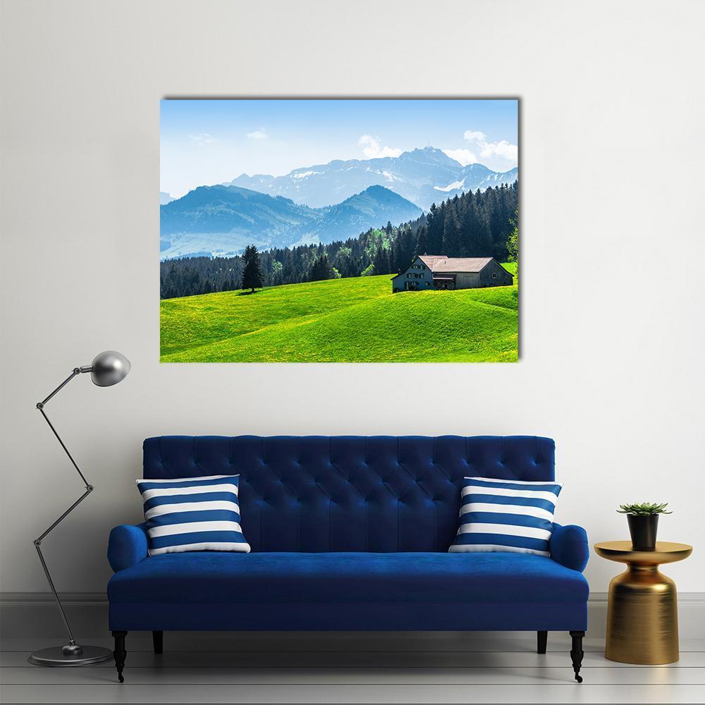 Alpine Landscape with Saentis Peak Canvas Wall Art in white, green and blue, single panel hung on a wall