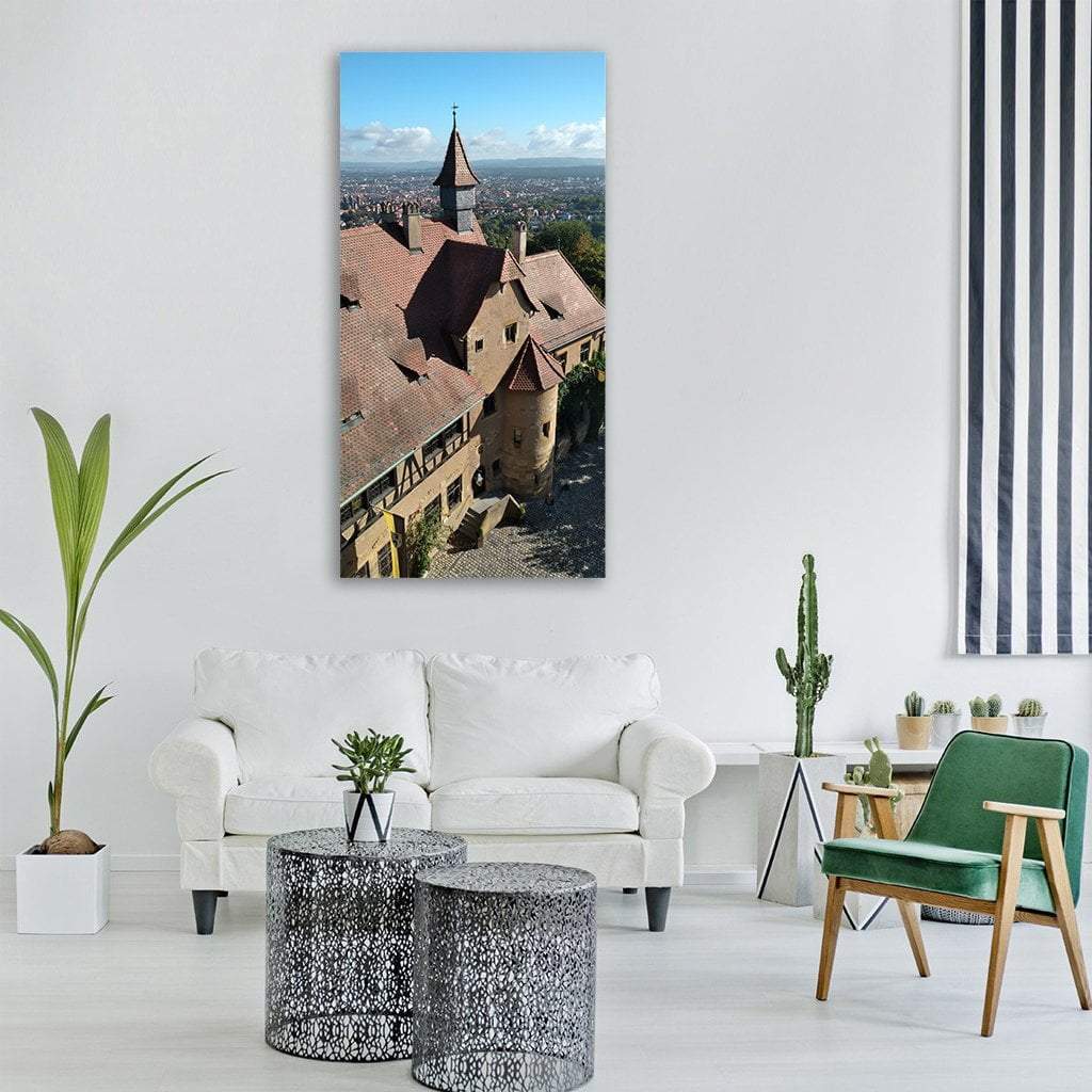 Altenburg Castle Aerial View Vertical Canvas Wall Art in gray, brown and blue, single vertical panel hung on a wall