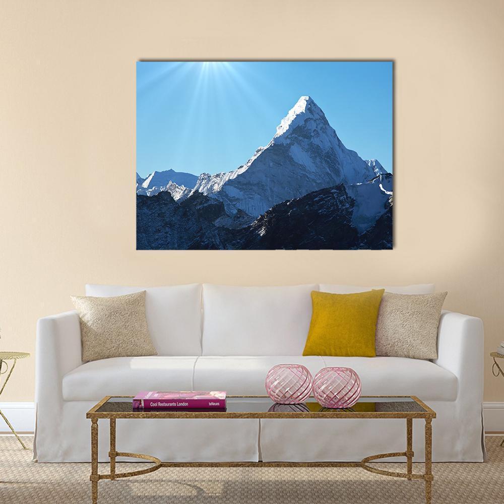 Ama Dablam Mountain Peaks Canvas Wall Art in white and blue, single panel hung on a wall