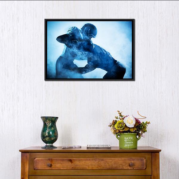 American Football Player Silhouettes Canvas Wall Art in black, white and blue, framed canvas, product view on a white background