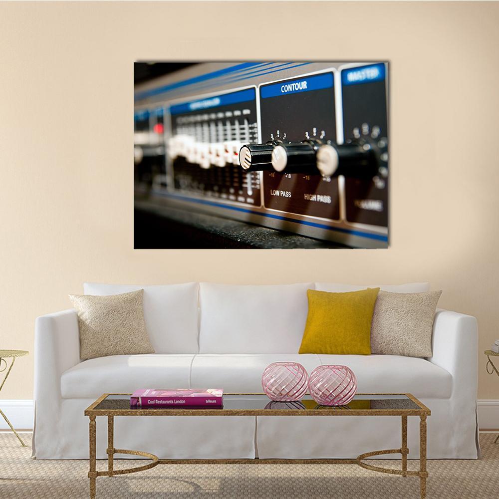 Audio Amplifier Controls Close-up Canvas Wall Art in black, silver and blue, single panel hung on a wall