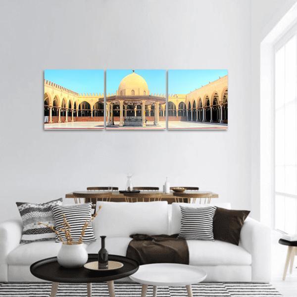 Ancient Mosque in Old Cairo Panoramic Canvas Wall Art in beige, yellow and blue, hung on a wall