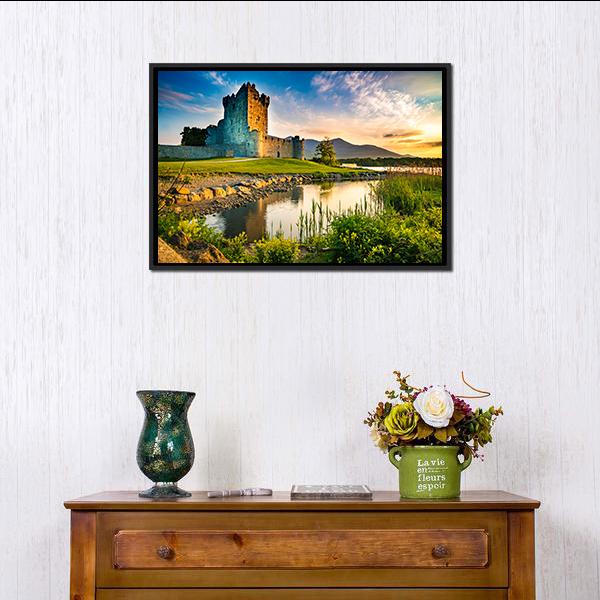 Ross Castle at Sunset Canvas Wall Art in yellow, green and blue, framed canvas, product view on a white background