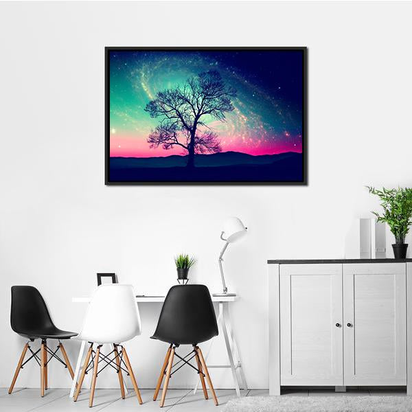 Andromeda Galaxy Over Earth Canvas Wall Art in blue, purple and pink, framed canvas, product view on a white background