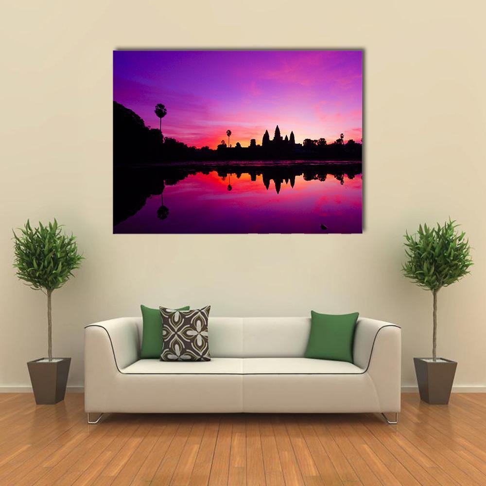 Angkor Wat Temple at Sunset Canvas Wall Art in black, purple and pink, single panel hung on a wall