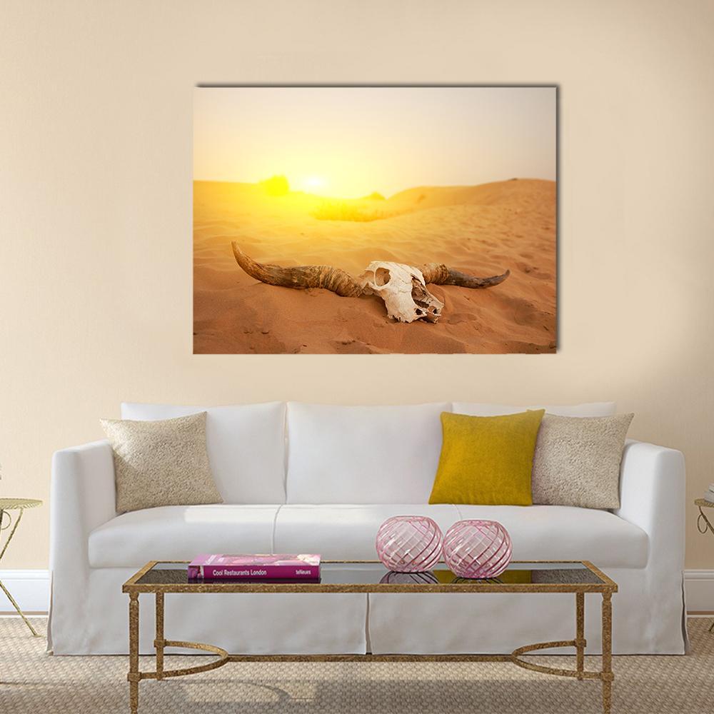 Bull Skull in Serene Desert Sunset Canvas Wall Art in brown, orange and yellow, single panel hung on a wall