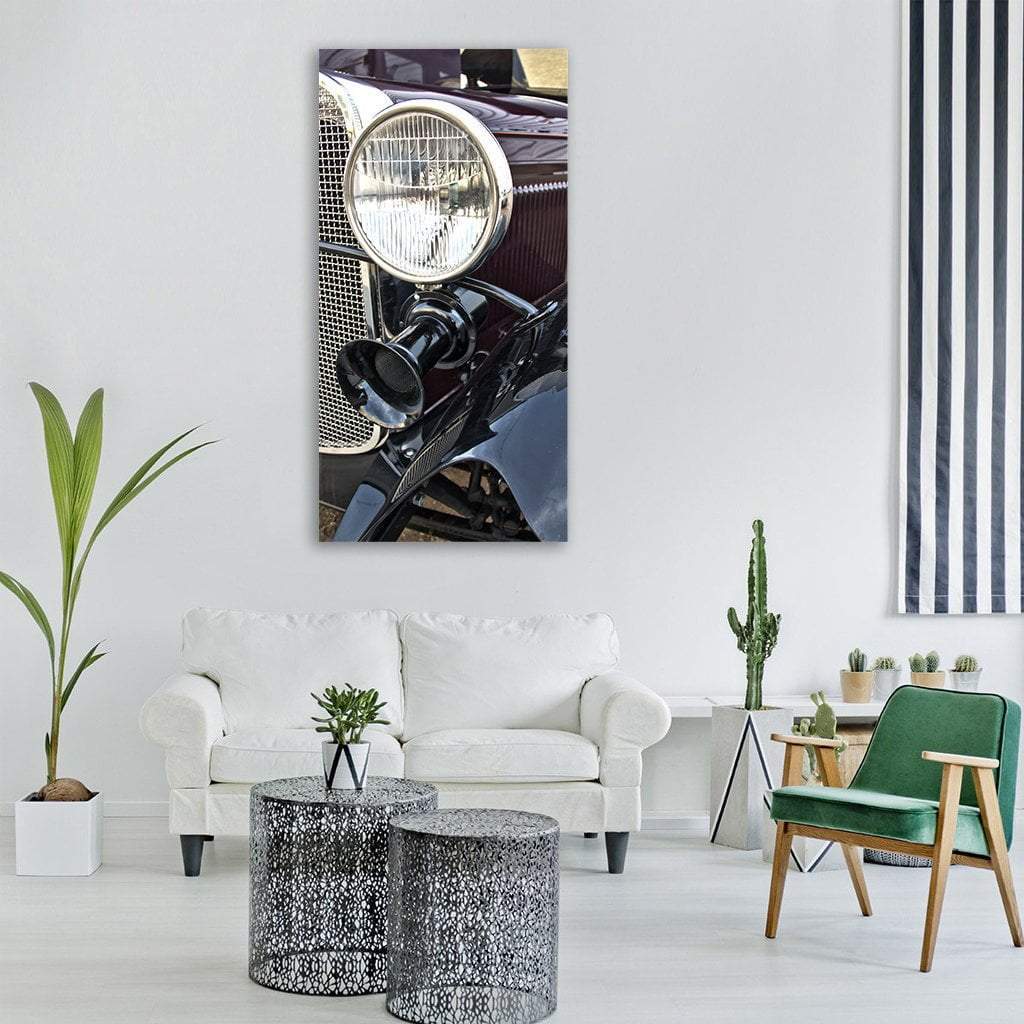 Vintage Maroon Car Headlight Detail Vertical Canvas Wall Art in black, silver and red, single vertical panel hung on a wall