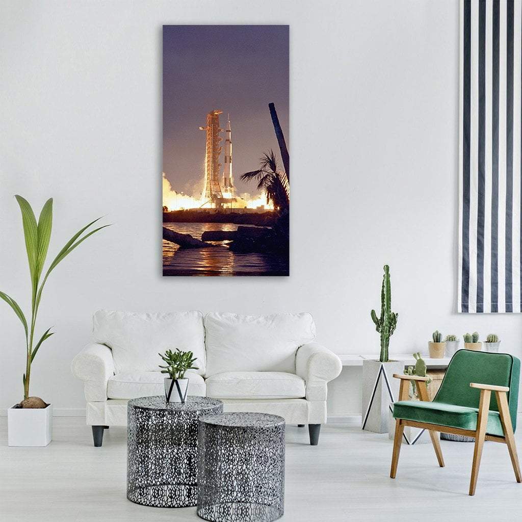 Apollo 14 Night Launch Over Water Vertical Canvas Wall Art in black, gray and orange, single vertical panel hung on a wall