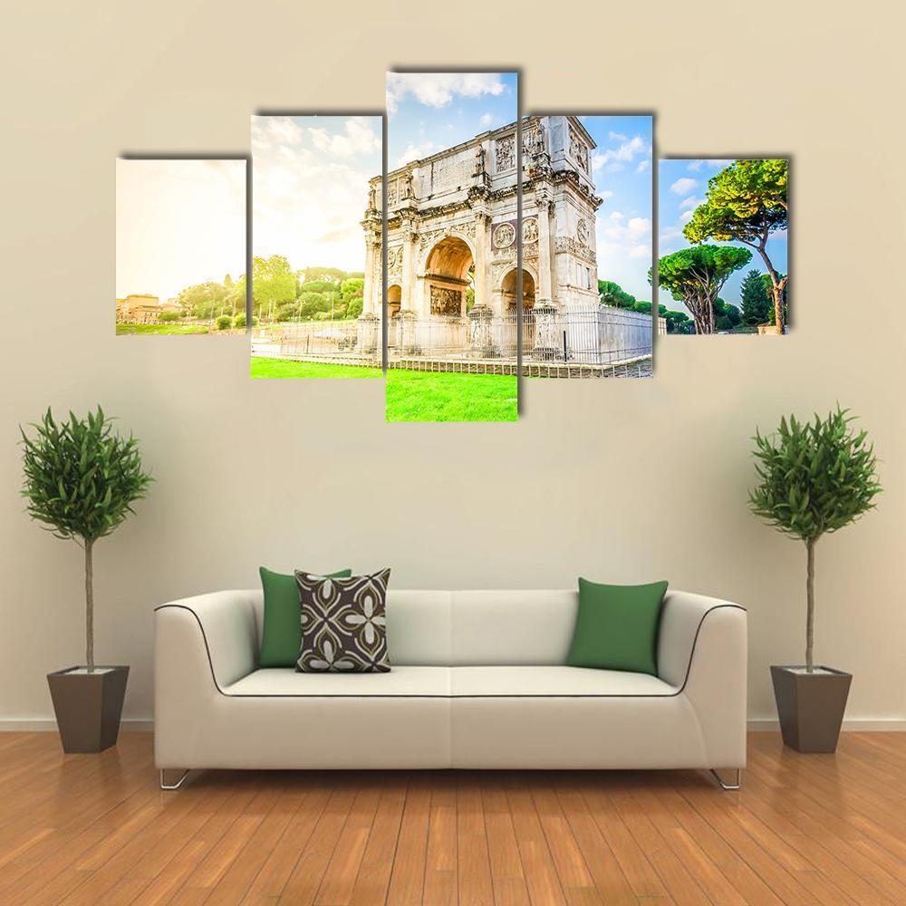 Arch of Constantine in Summer Light Canvas Wall Art in beige, green and blue, 5 panel Star layout hung on a wall