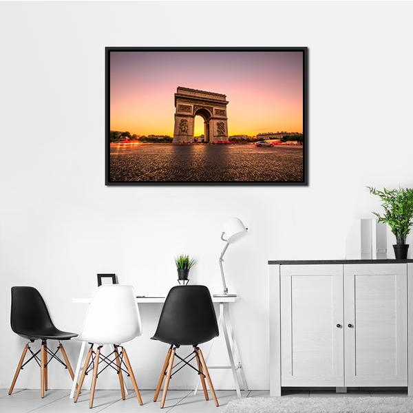 Arc De Triomphe at Golden Hour Canvas Wall Art in orange, yellow and purple, hung on a wall
