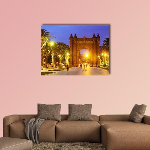 Arc De Triomf at Evening, Barcelona Canvas Wall Art in orange, yellow and blue, single panel hung on a wall