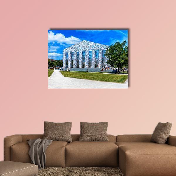 Book-covered Temple Facade Canvas Wall Art in white, green and blue, single panel hung on a wall
