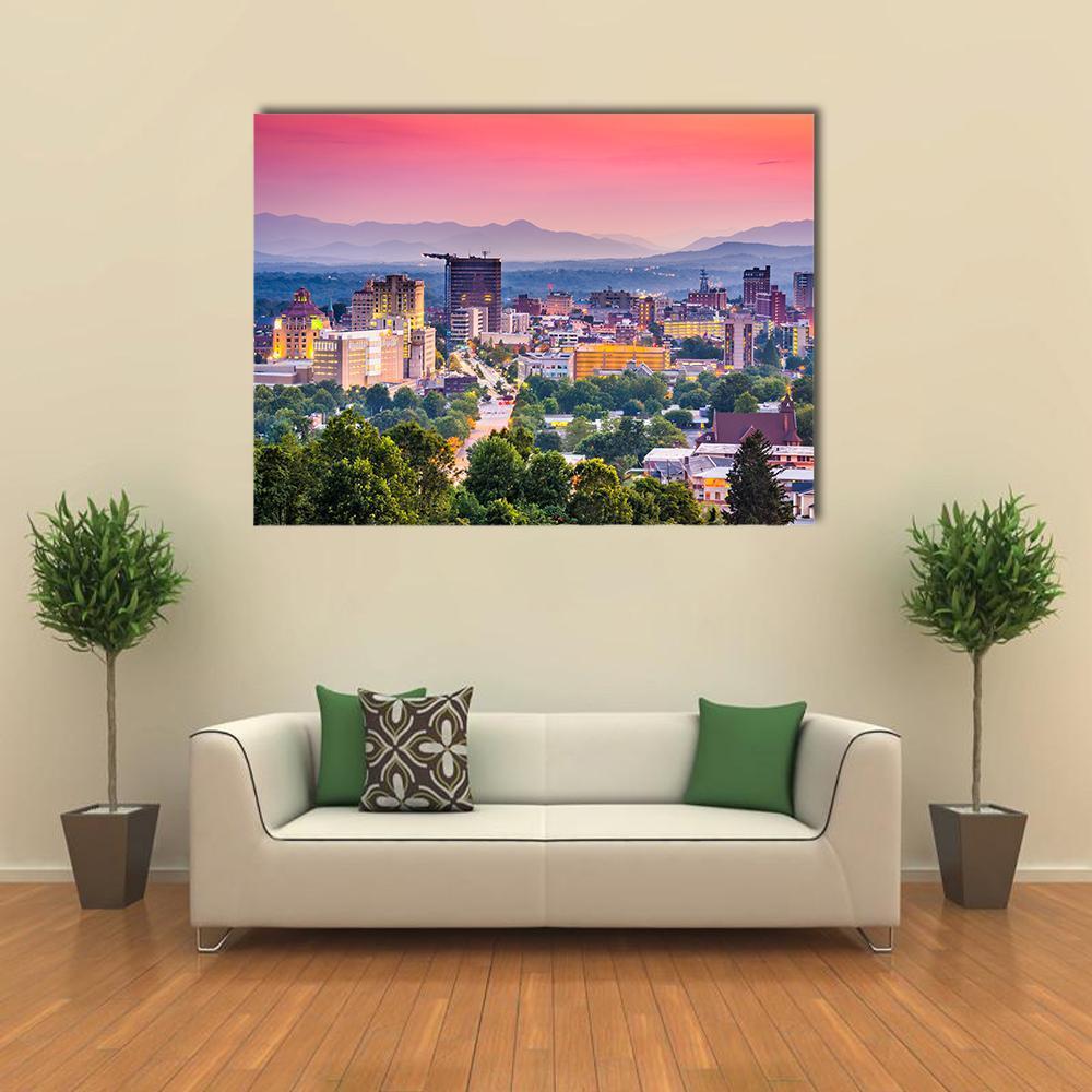 Asheville Skyline at Dusk Canvas Wall Art in green, blue and pink, single panel hung on a wall