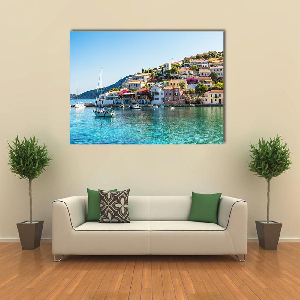 Greek Islands Cityscape Canvas Wall Art in white, green and blue, single panel hung on a wall