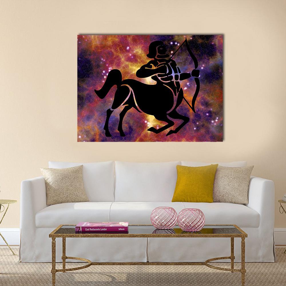 Sagittarius Centaur Nebula Silhouette Canvas Wall Art in black, orange and purple, single panel hung on a wall