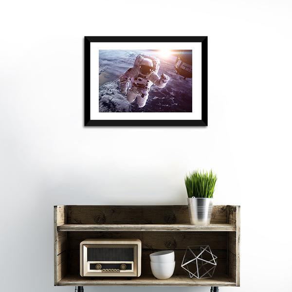 Astronaut Above The Earth Canvas Wall Art-1 Piece-Framed Print-20" x 16"-Tiaracle