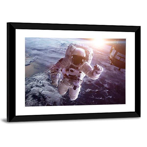 Astronaut Above The Earth Canvas Wall Art-3 Horizontal-Gallery Wrap-25" x 16"-Tiaracle