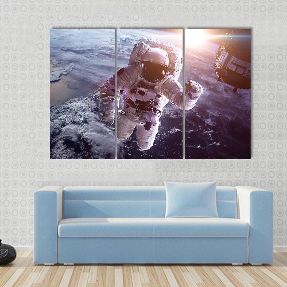 Astronaut Above The Earth Canvas Wall Art-3 Horizontal-Gallery Wrap-37" x 24"-Tiaracle