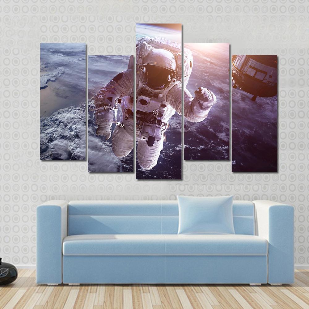 Astronaut Above The Earth Canvas Wall Art-5 Pop-Gallery Wrap-47" x 32"-Tiaracle
