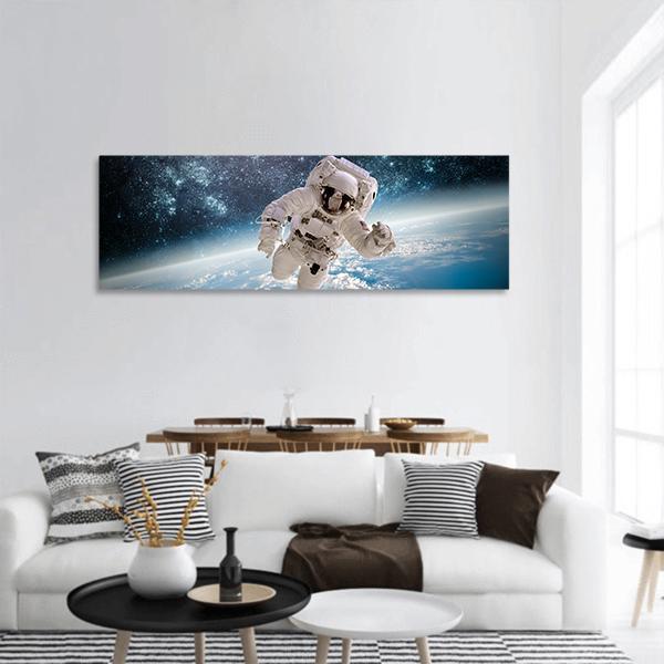 Astronaut In Outer Space Panoramic Canvas Wall Art-1 Piece-36" x 12"-Tiaracle
