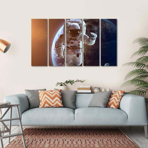 Astronaut Near Planet Earth Canvas Wall Art-5 Horizontal-Gallery Wrap-22" x 12"-Tiaracle