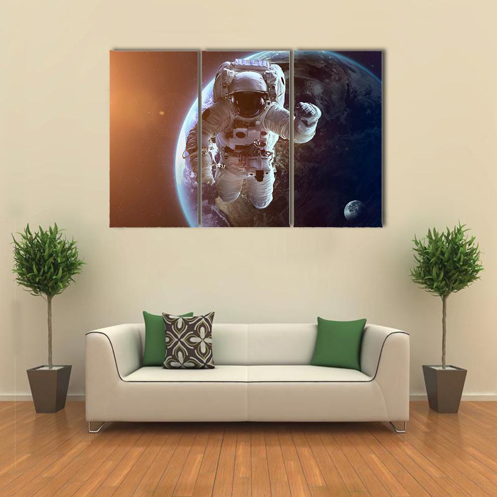 Astronaut Near Planet Earth Canvas Wall Art-3 Horizontal-Gallery Wrap-37" x 24"-Tiaracle